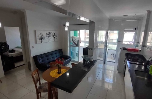 Praia Grande Apartamento | Complete apartment with sea view, 1 block from the beach and 1 parking space