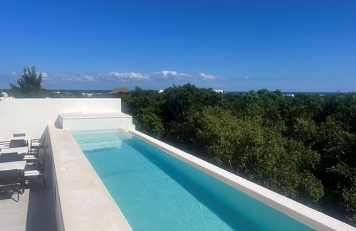 Mexico Condominio | CONDO, AKUMAL, MEXICO IN A RESORT COMMUNITY