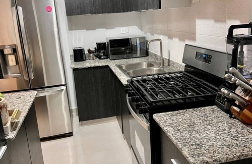 Villa Mella Apartamento | Condo confortable avec piscine, votre oasis de confort à Santo Domingo Nord