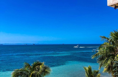 La Paz Apartamento | Condo estilo mexicano a la orilla del mar, ideal para vacaciones familiares.