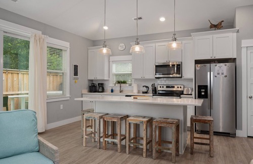 Whalehead Beach Casa | Condo with Private Hot Tub! Dogs ok! Short walk to beach, comm. Pool