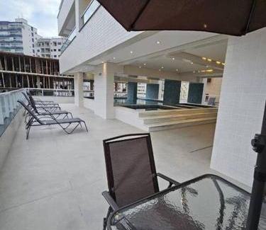Caicara Apartamento | condominio clube com piscina climatizada com fechamento em vidro - Vila Caiçara - Praia Grande 4 adultos e 1 criança até 12 anos