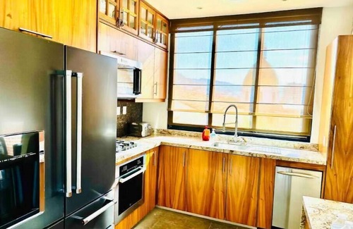 Proyecto escola Condominio | Condominum Iturbide with Breathtaking mountain and ocean views
