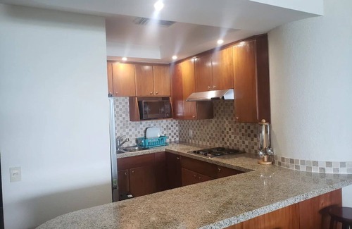 Colonia El Progreso Hotel | Condos HB