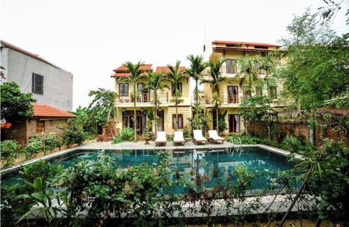 Hoi An Apartamento | Connecting room in Upscale Orchid Riverside Oasis.