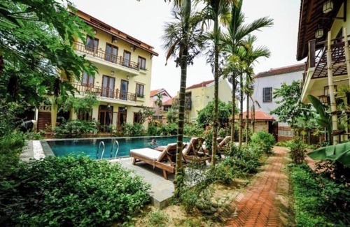 Hoi An Apartamento | Connecting room in Upscale Orchid Riverside Oasis.