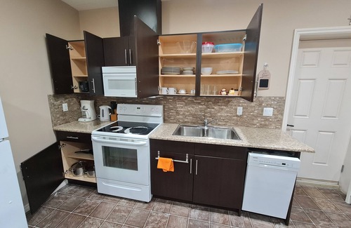 Southeast Edmonton Casa | Contemporary & Cheerful 1-Bedroom Suite with Fireplace