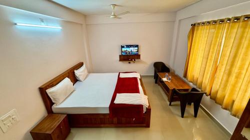 Malpe Hotel | Coral Comfort