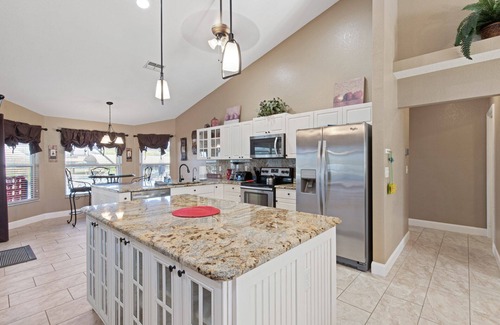 Burnt Store Casa | Coral Paradise - 4/2 Gulf Access Home with Electric Heated Pool, Game Room, Kayaks, Tiki Hut