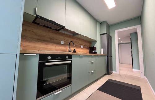 Stefanestii de Jos Apartamento | Cosmopolis Family Apartment - Pools & Gym