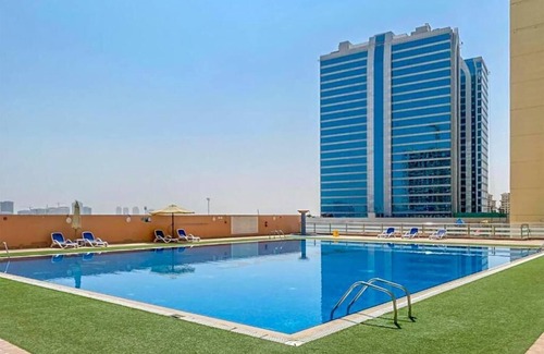Dubai Production City Apartamento | Cosmos Living Stunning Apt in Lago Vista