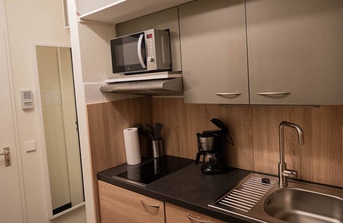 Schoenwald Apartamento | Acogedor apartamento 18 con vistas al jardín, Wi-Fi y balcón