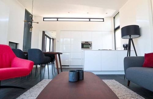 Nieuwvliet Casa | Acogedor apartamento en villa para 4 personas con WIFI, TV, terraza y aparcamiento