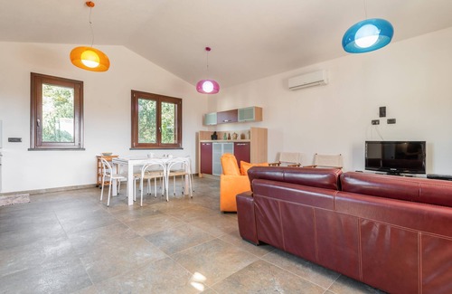 Chia Casa | Acogedor apartamento vacacional "Villa Fico 2" con balcón, jardín y aire acondicionado.