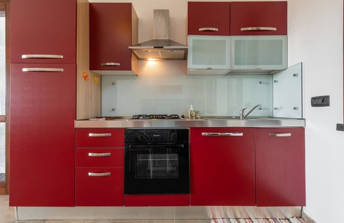 Chia Casa | Acogedor apartamento vacacional "Villa Fico 2" con balcón, jardín y aire acondicionado.