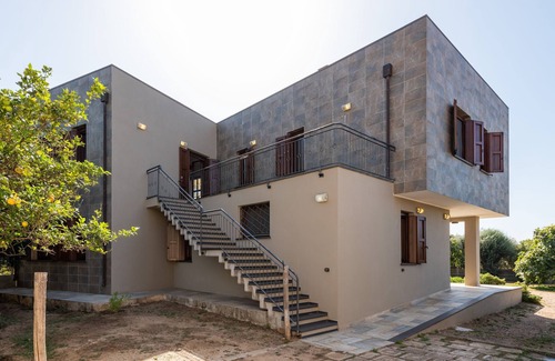 Chia Casa | Acogedor apartamento vacacional "Villa Fico 2" con balcón, jardín y aire acondicionado.