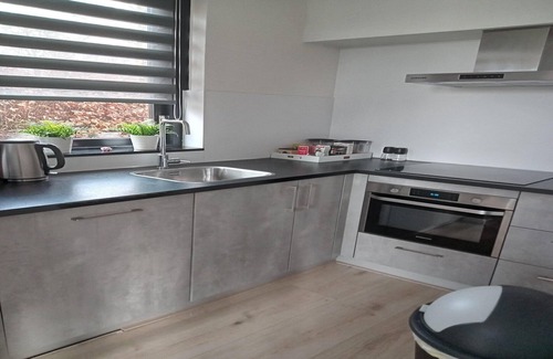 Ewijk Casa | Acogedora casa de vacaciones con jardín.