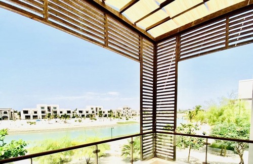 Taqah Apartamento | Cosy studio with a lagoon view in Hawana resort
