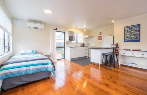 Dunedin Casa | Acogedor y cálido bungalow junto al mar