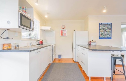 Dunedin Casa | Acogedor y cálido bungalow junto al mar