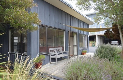 Dunedin Casa | Acogedor y cálido bungalow junto al mar