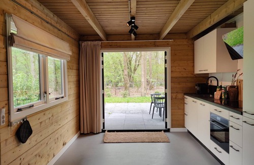 Zon en Schild Casa | Cosy wooden house with hot tub in forest