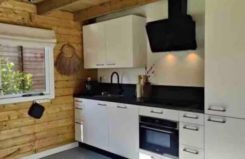 Zon en Schild Casa | Cosy wooden house with hot tub in forest