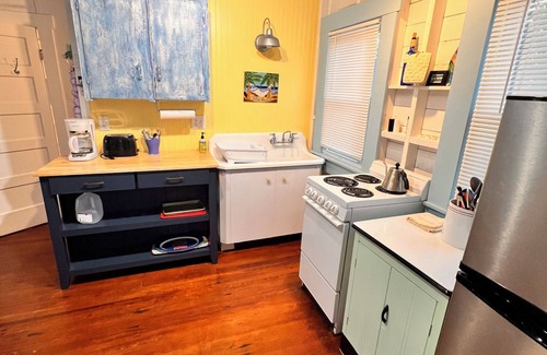 Bradenton Beach Cabaña | Cottage A of Historic Waterfront Fish Camp. Private Dock. Minute walk to Beach