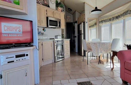 Upper Grand Lagoon Casa | Cottage on Lake in a Gated Resort Property Near Beaches & Entertainment