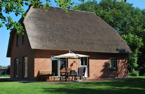 Nordstrand Casa | Cottage en motivos como el parque con estanque