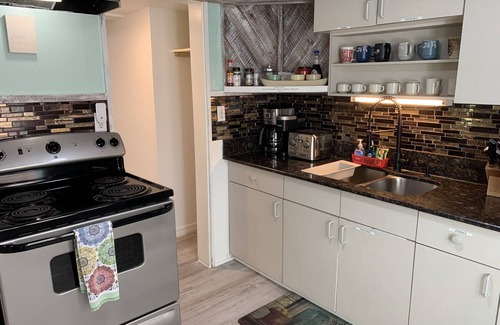 Clearwater Beach Cabaña | Cottage on the beach! 30 second walk away! Heated pool on the property!