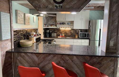 Clearwater Beach Cabaña | Cottage on the beach! 30 second walk away! Heated pool on the property!