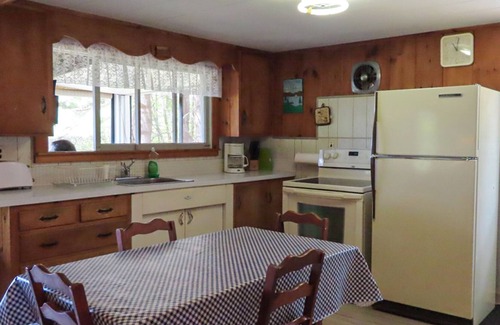 Meredith Cabaña | Cottage with beach access, a fireplace, yard, grill, cable & golf nearby