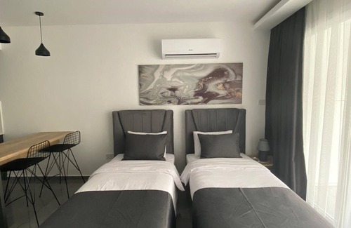 Trikomo Complejo | Courtyard Long Beach Holiday Resort - Studio