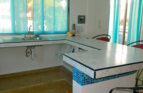 Colonia Independencia Apartamento | Cozumel, México. apartamentos tipo estudio Cerca de playas, tiendas, buceo y restaurantes.