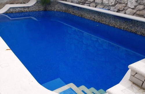 Colonia Independencia Apartamento | Cozumel peaceful retreat, WIFI, pool TV, Kitchenet, walking distance to town.