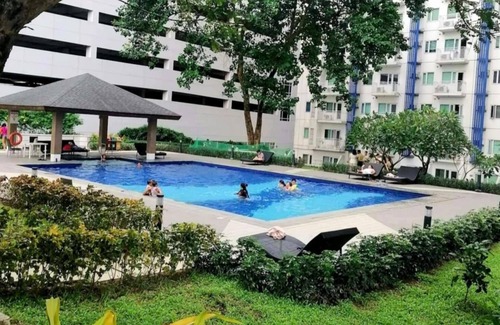 Santo Cristo Condominio | Cozy 1-bedroom condo in terrific Quezon City with AC, WiFi