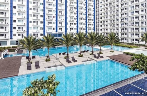 Makati Central Business District Condominio | Cozy 1-bedroom condo in lovely Makati with Pool and City view, WiFi and Netflix