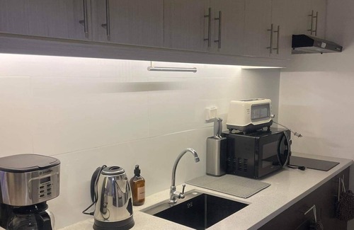 Guadalupe Condominio | Cozy 1-bedroom condo with WiFi, rooftop pool &fitness room in pleasant Cebu City