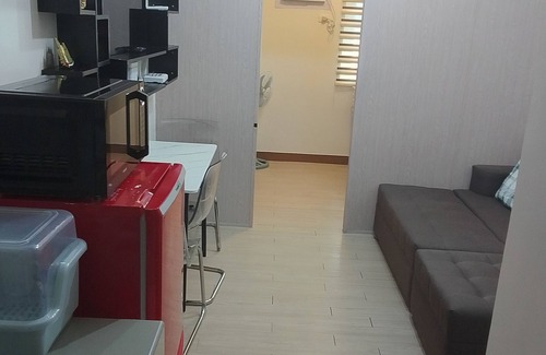 Novaliches Apartamento | Cozy 1-Bedroom in Trees with Netflix, WiFi, Mini Speaker Karaoke with dual Mic