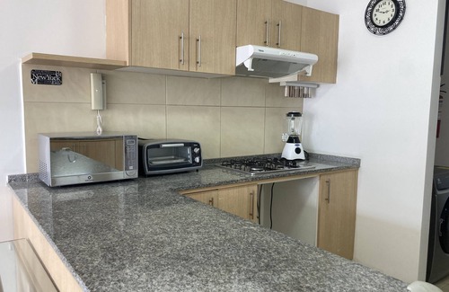 La Floresta Apartamento | Cozy 2-bedroom apartment with WiFi, fitness room in charming Quito