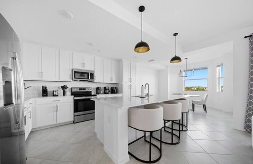 Biggar Condominio | Cozy 2-bedroom condo with WiFi, fitness room in charming Babcock Ranch Florida.
