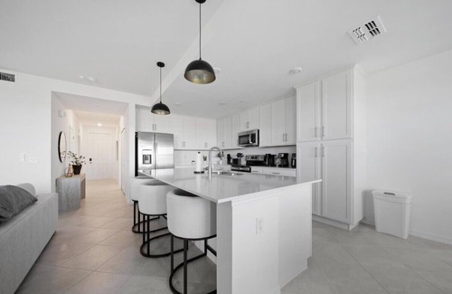 Biggar Condominio | Cozy 2-bedroom condo with WiFi, fitness room in charming Babcock Ranch Florida.