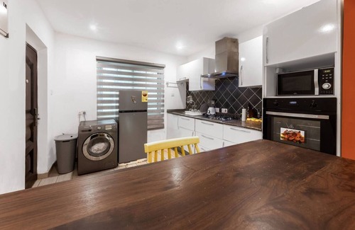 Santeo Casa | Cozy 2-bedroom townhome with AC and WiFi in brilliant Adenta