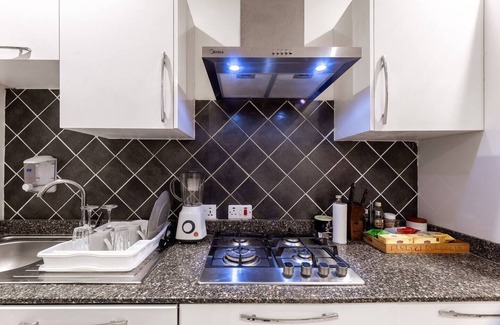 Santeo Casa | Cozy 2-bedroom townhome with AC and WiFi in brilliant Adenta