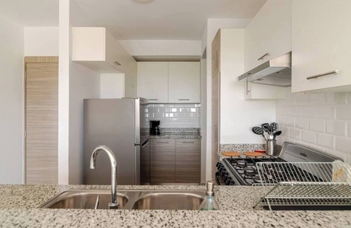 Punta Cana Apartamento | Cozy 2BR/2BA Retreat: Pool, Jacuzzi & Cityscape