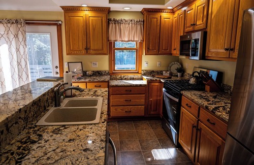 Gilford Casa | Cozy and fully renovated 4-bedroom rental property, available for you to enjoy.