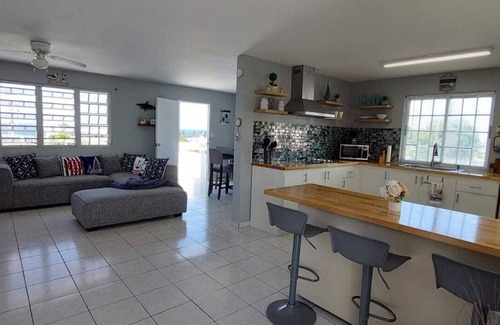 Hato Abajo Apartamento | Cozy apartment on a 2nd floor close to beaches, restaurants, shopping, and more