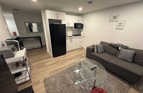 Dieppe Casa | Cozy Basement Apartment with Private Entrance and Office space-4 Mins to Airport