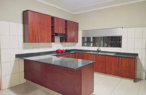 Matsapha Casa | Cozy bedroom ensuite, fully equipped retreat.
